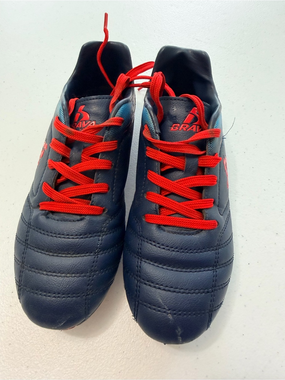 Boy’s Navy Soccer with Red Laces